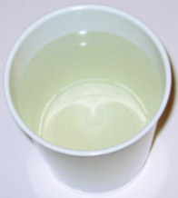 Cup of yellow colloidal silver