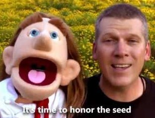 Mike Adams with a Puppet Honoring The Seed
